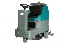 Self-propelled floor washing machine, sit-on, steerable